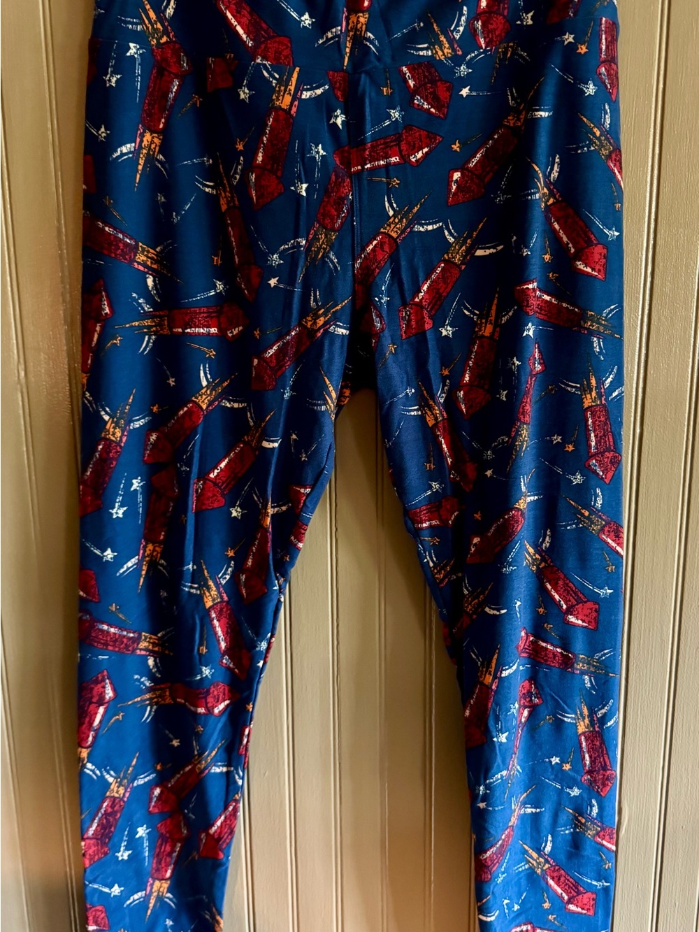 LuLaRoe New without tags Navy Leggings with Red Rockets Tall & Curvy